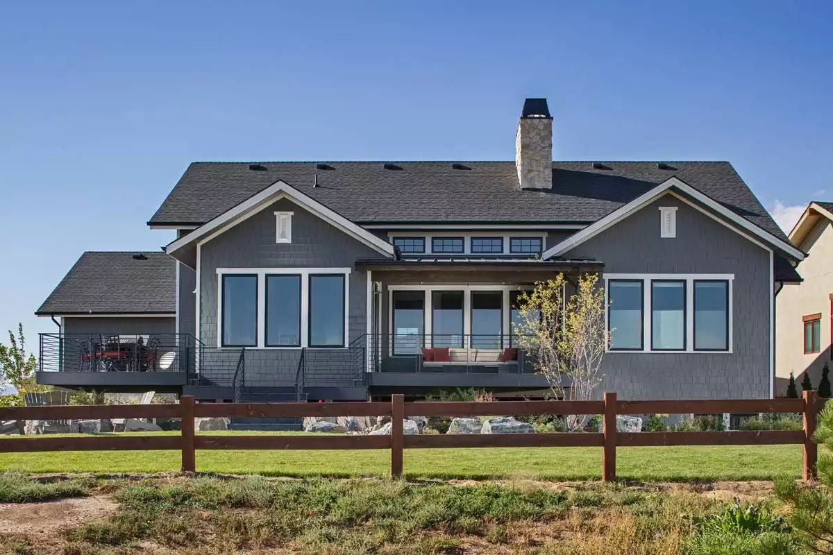 Gray Shingle Siding Meets Covered Deck Living on a Ranch-Style Lot