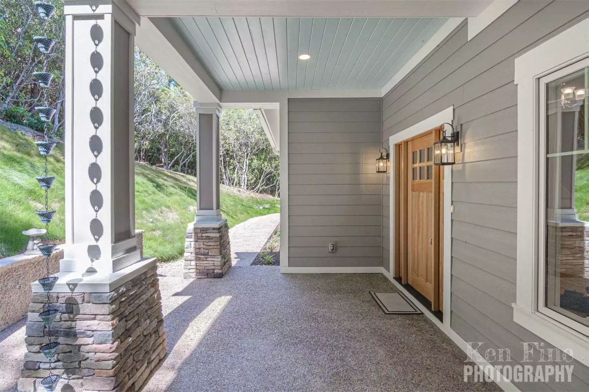 Rain Chain Column Detail Anchors a Craftsman Porch with Stone Base