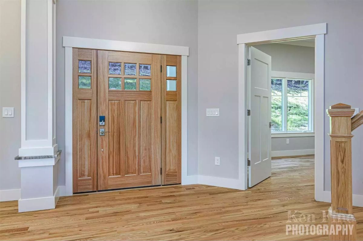 Craftsman Front Entry Pairs Warm Wood Tones with Light Gray Walls