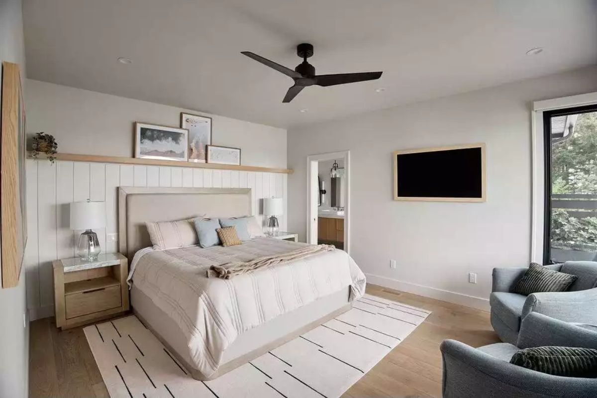 Serene Primary Bedroom with Shiplap Accent Wall and Ensuite Access