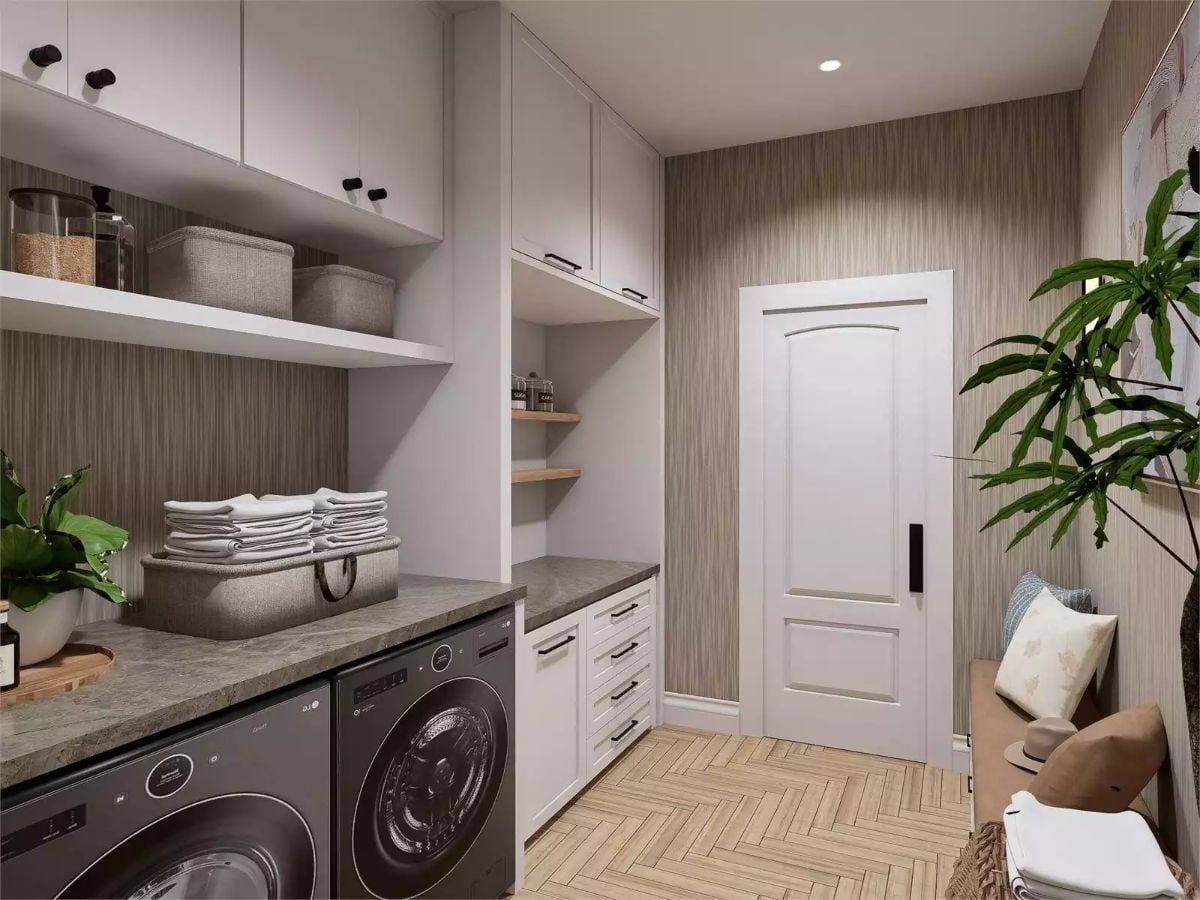 Marble Countertops and Built-In Cabinetry Keep This Laundry Room Hardworking