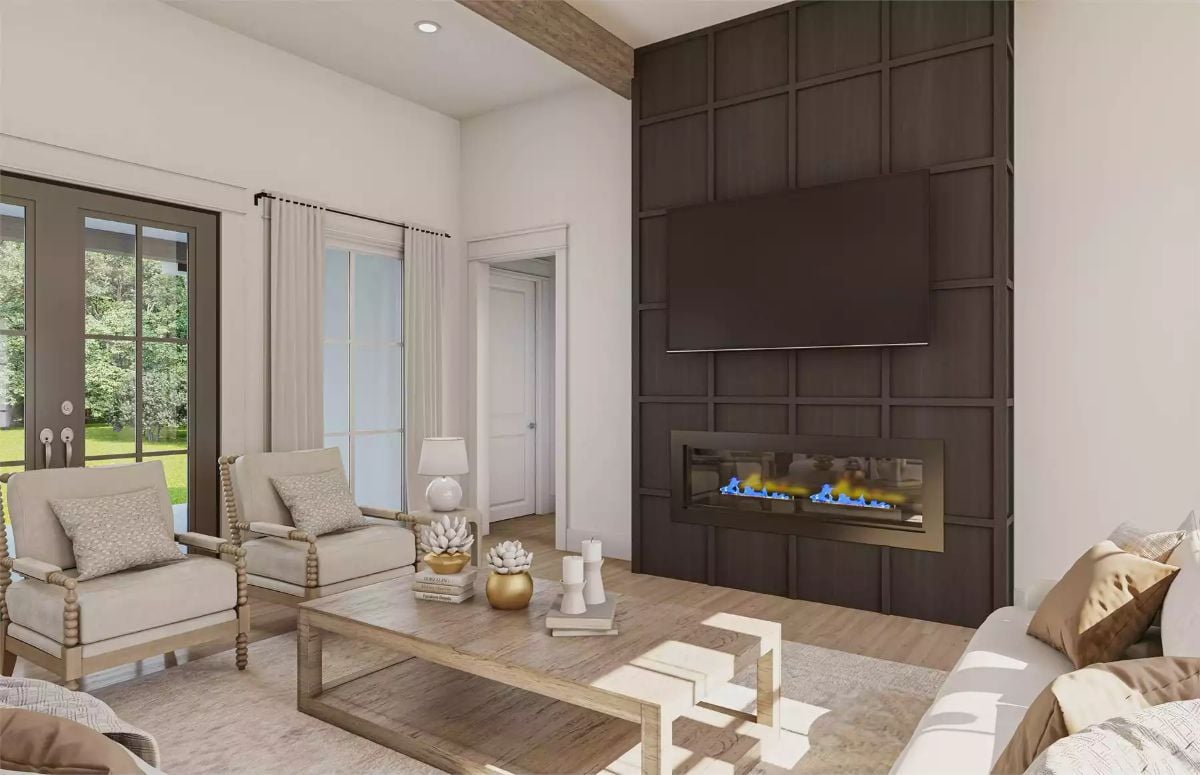 Dark Paneled Fireplace Wall Commands Attention in This Farmhouse Living Room