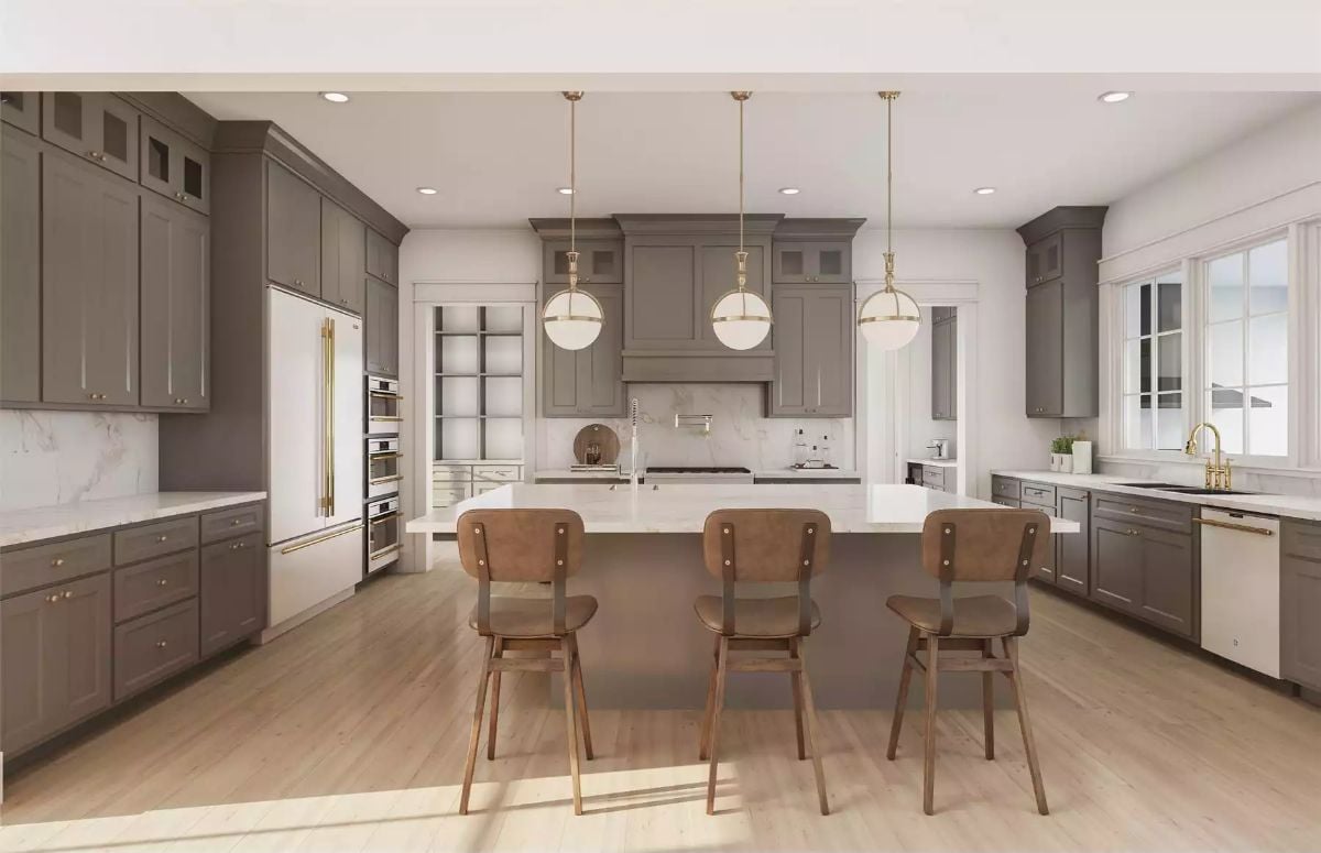 Gray Cabinetry and Brass Hardware Set the Tone in This Kitchen