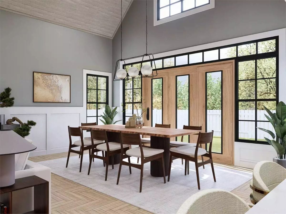 Vaulted Dining Room Pairs French Doors With Mid-Century Chairs