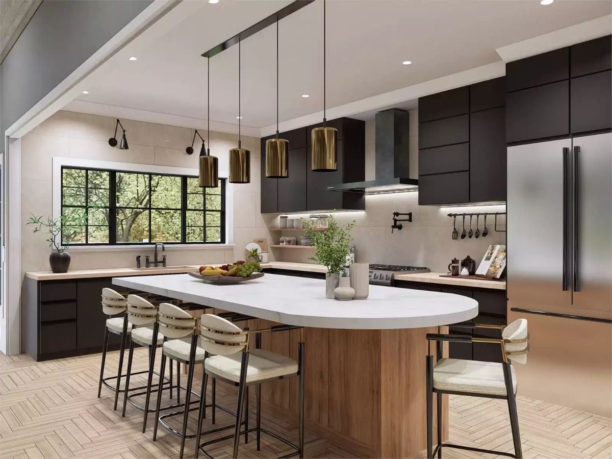 Oval Island and Brass Pendants Anchor This Transitional Kitchen