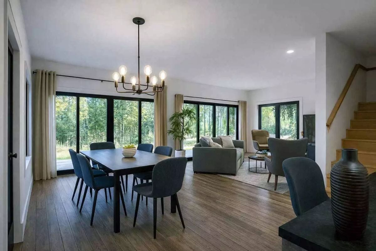 Open Concept Dining and Living Room with Black-Framed Windows