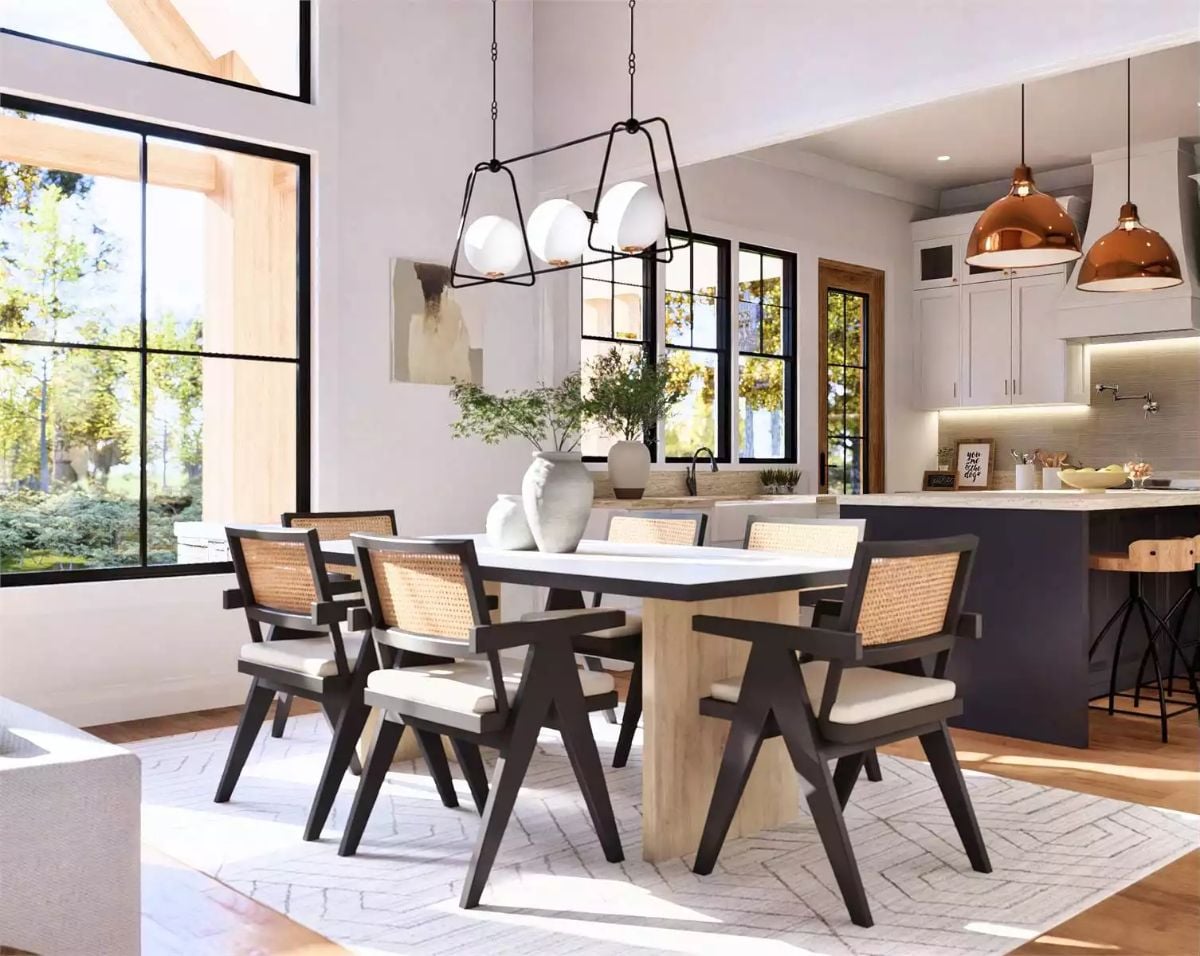 Dining Area with Cane-Back Chairs and Black Frame Light Fixture