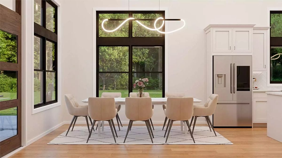 Dining Area with Sculptural LED Pendant and Neutral Upholstered Chairs