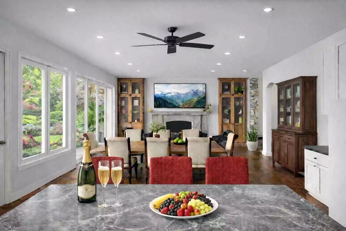 Open-Concept Dining Room with Champagne Service and Mountain Fireplace View