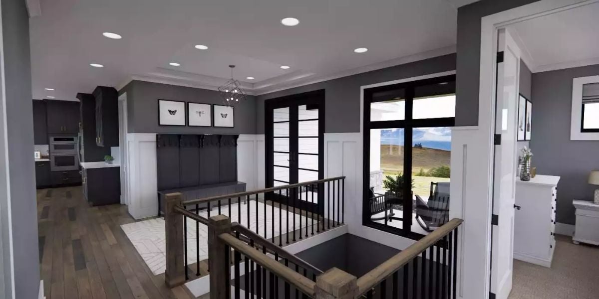 Entry Foyer with Black Metal Staircase and Mudroom Storage