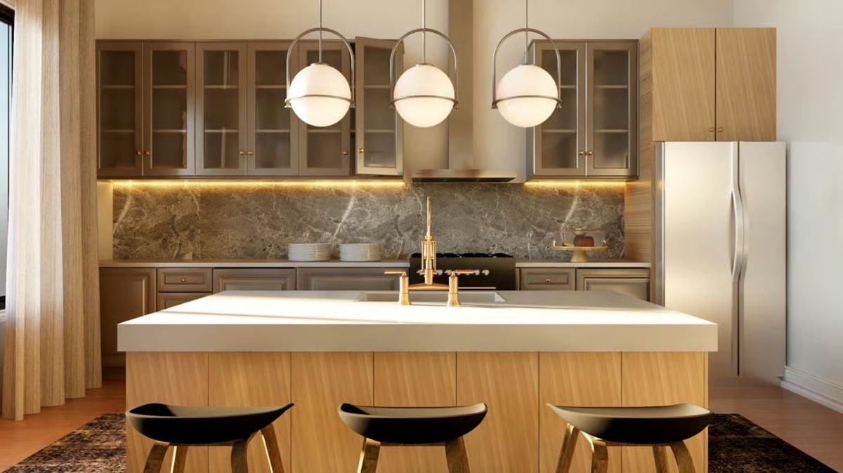 Globe Pendants and Gold Hardware Set the Tone in This Kitchen
