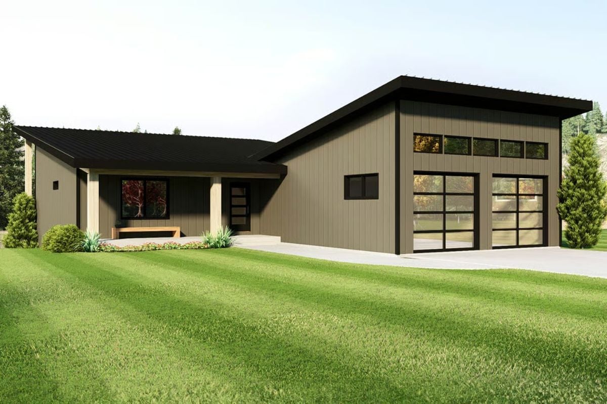 Vertical Board Siding Meets Glass Garage Doors on This Modern Ranch Exterior