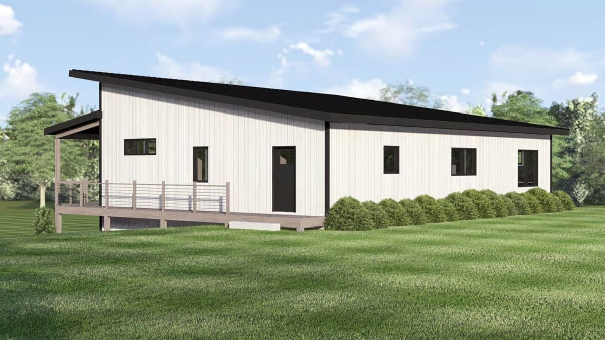 Mono-Pitch Roof and White Board-and-Batten Siding Define This Barndominium exterior