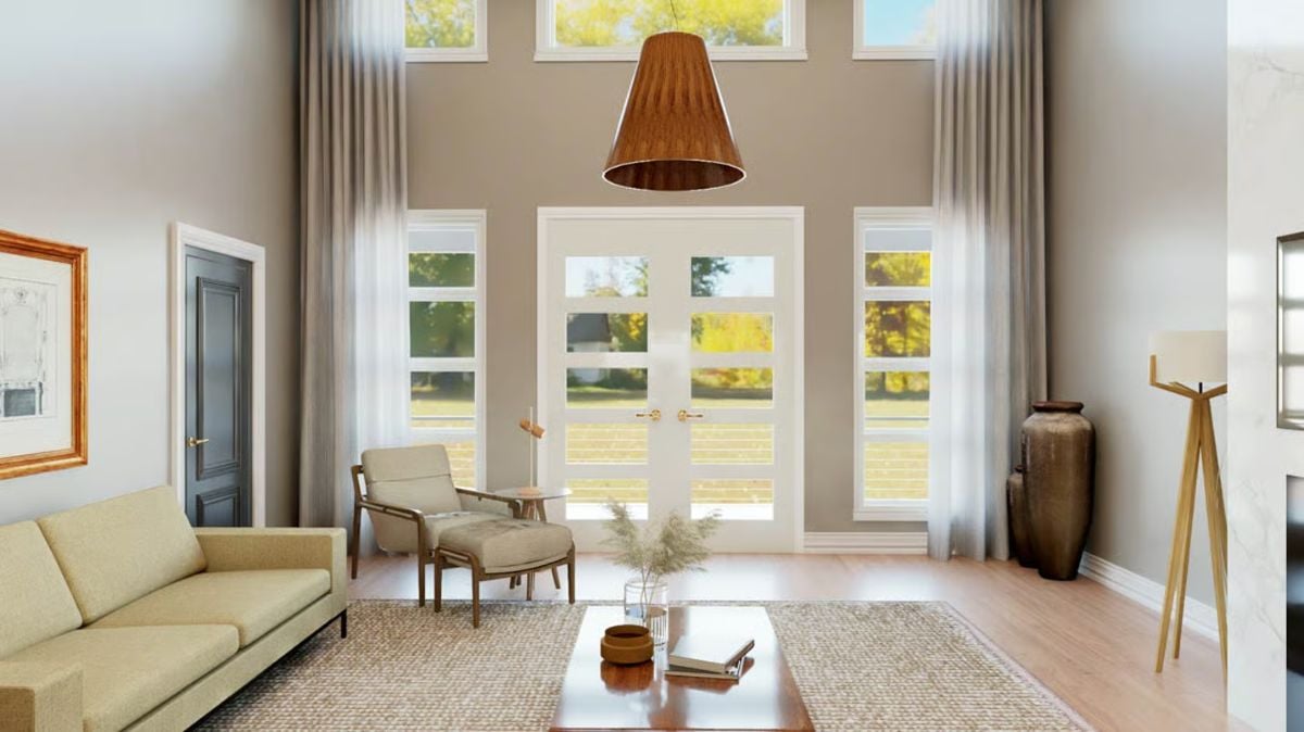 Soaring Ceilings and French Doors Pull Natural Light Deep Into This Living Room