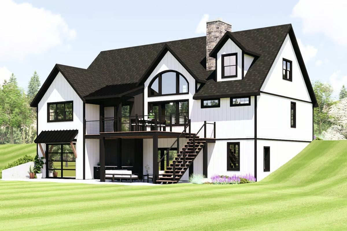 Black Trim and White Board-and-Batten Define This Modern Farmhouse Rear Elevation