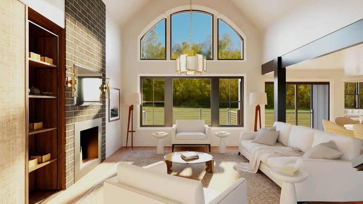 Vaulted Ceilings and Brick Fireplace Anchor This Sun-Filled Great Room