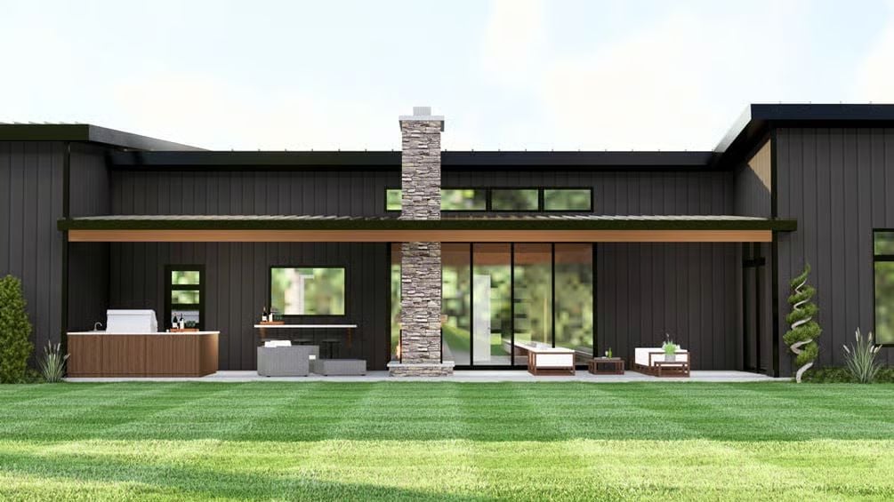 Dark Siding, Stone Chimney, and a Covered Patio Built for Entertaining
