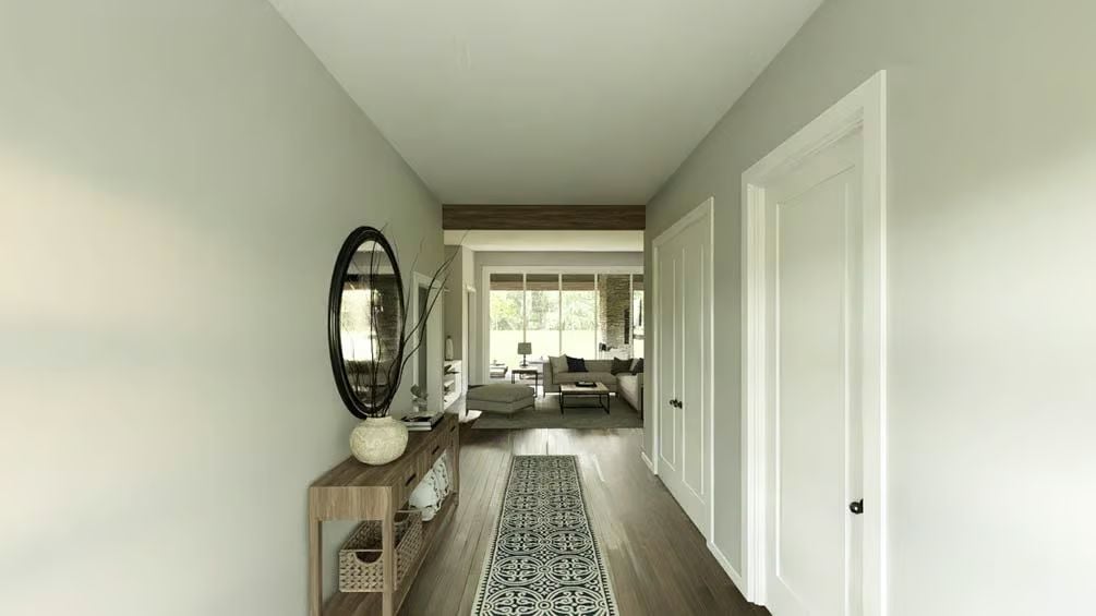 Patterned Runner and Oval Mirror Set the Tone Before You Step Inside
