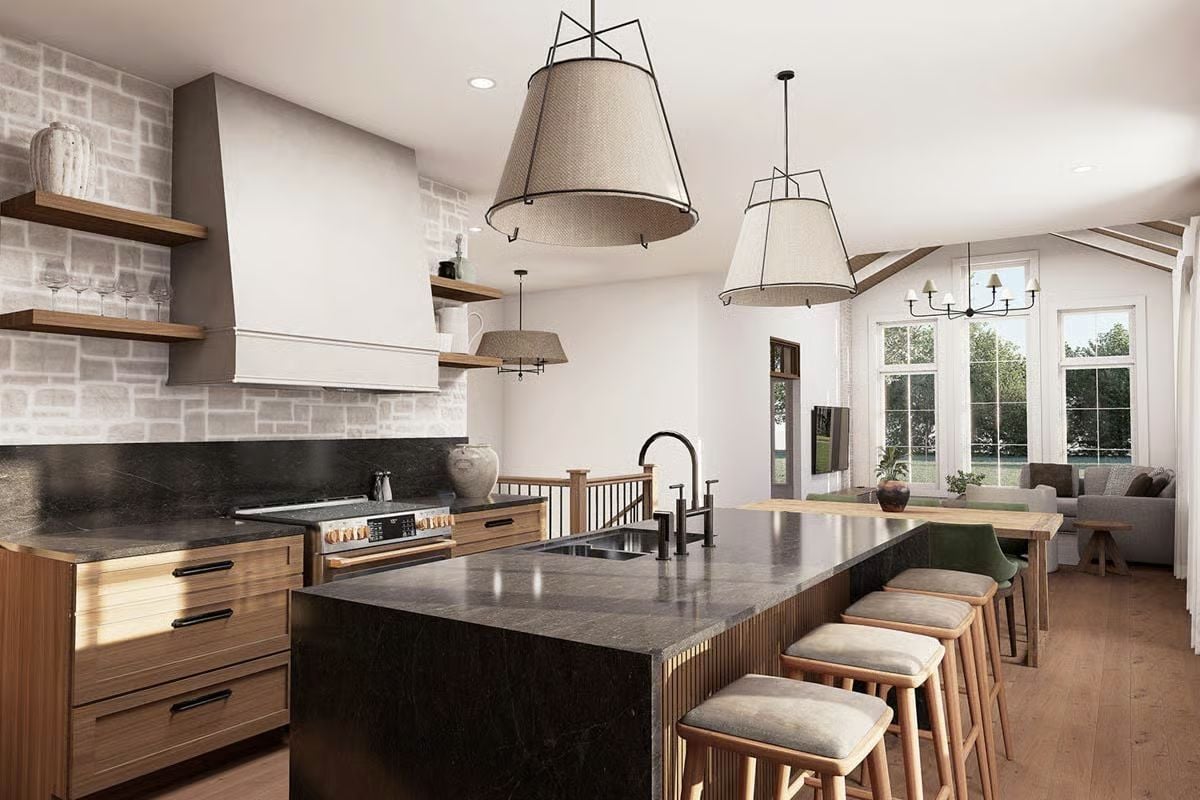 Dark Granite Island and Fluted Panels Make the Kitchen Worth Lingering In