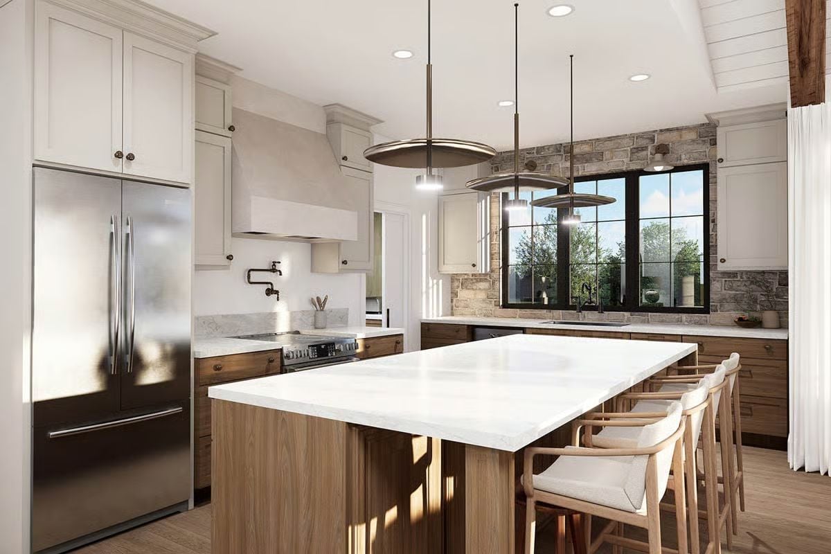 Waterfall Island and Warm Wood Cabinets Define This Craftsman Kitchen