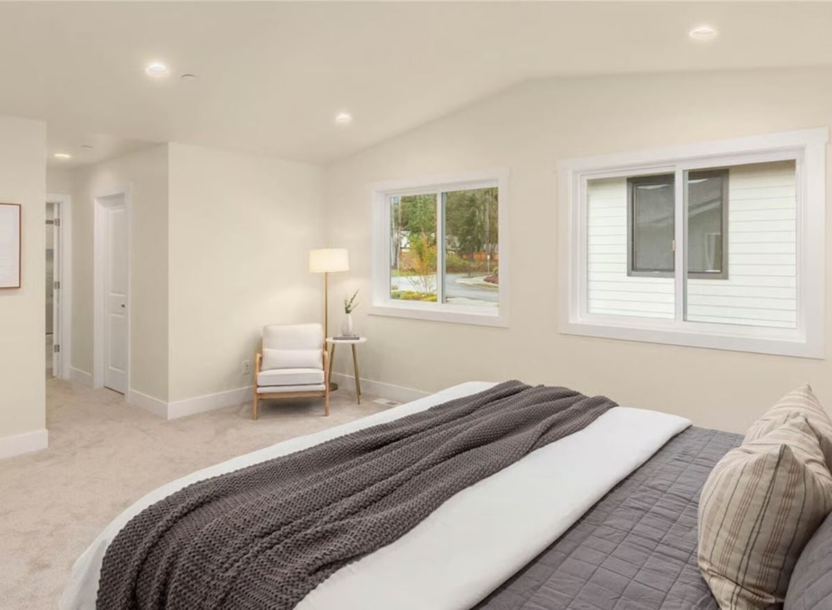 Vaulted Ceiling and Reading Nook Give This Primary Bedroom Room to Breathe