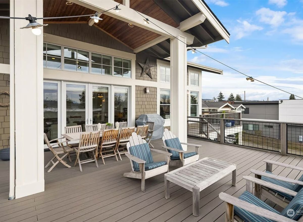 Covered Rooftop Deck with Adirondack Seating and String Lights