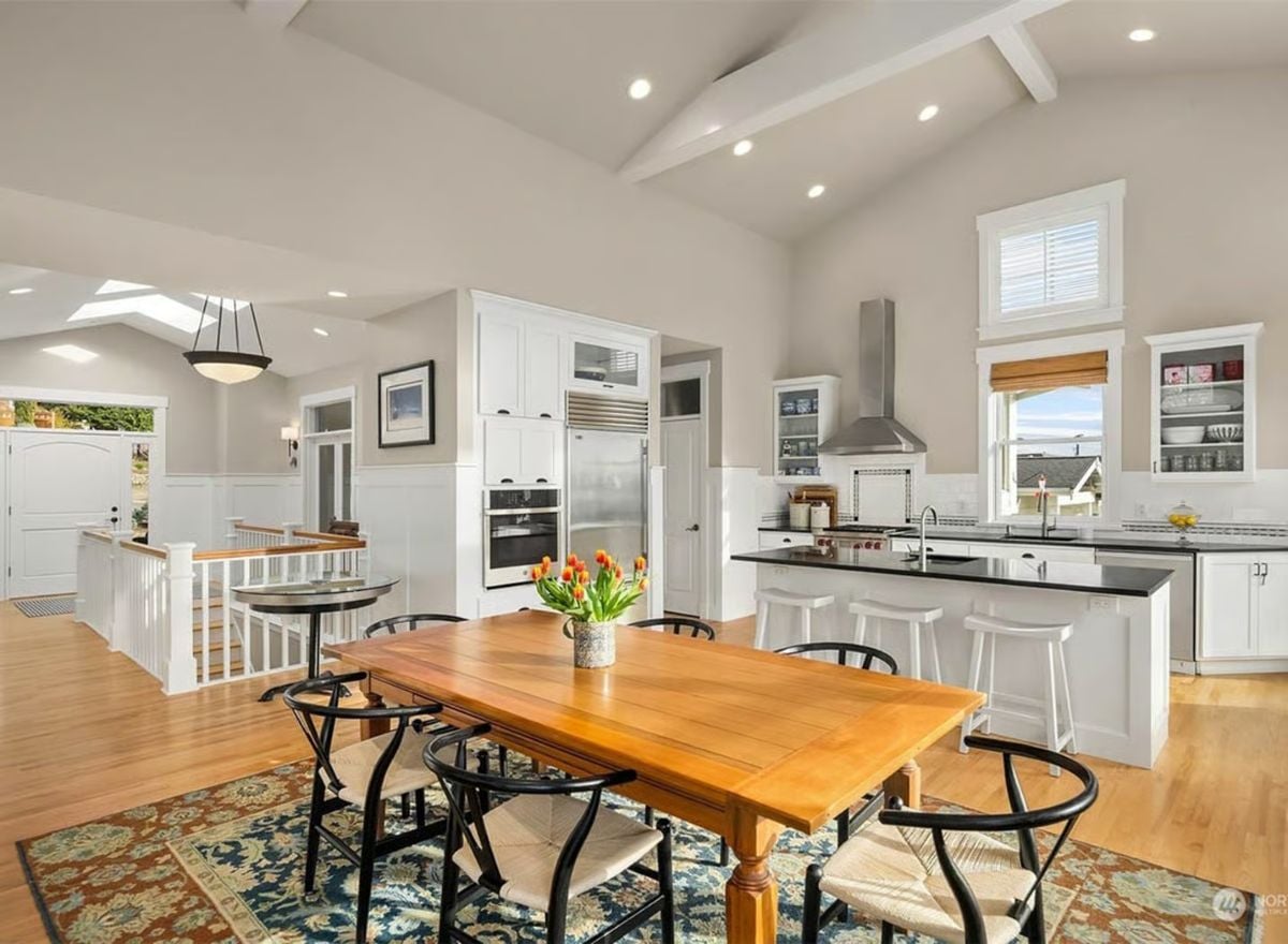 Vaulted Kitchen-Dining Space with Exposed Beams and Farmhouse Table