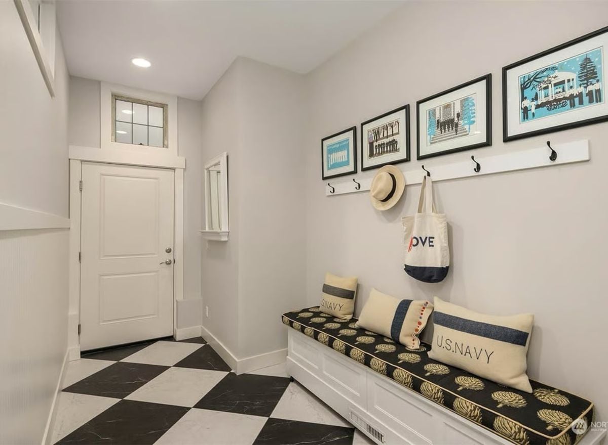 Mudroom Bench with Navy Pillows, Hook Rail, and Checkered Tile Floor
