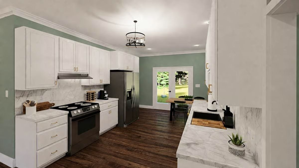 Sage Green Walls and Marble Countertops Set the Tone in This Kitchen