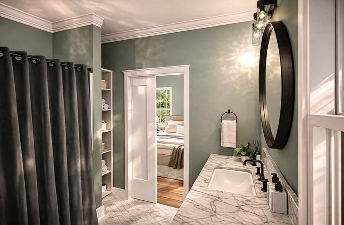 Marble Countertops and Matte Black Fixtures Define This Ensuite Bath