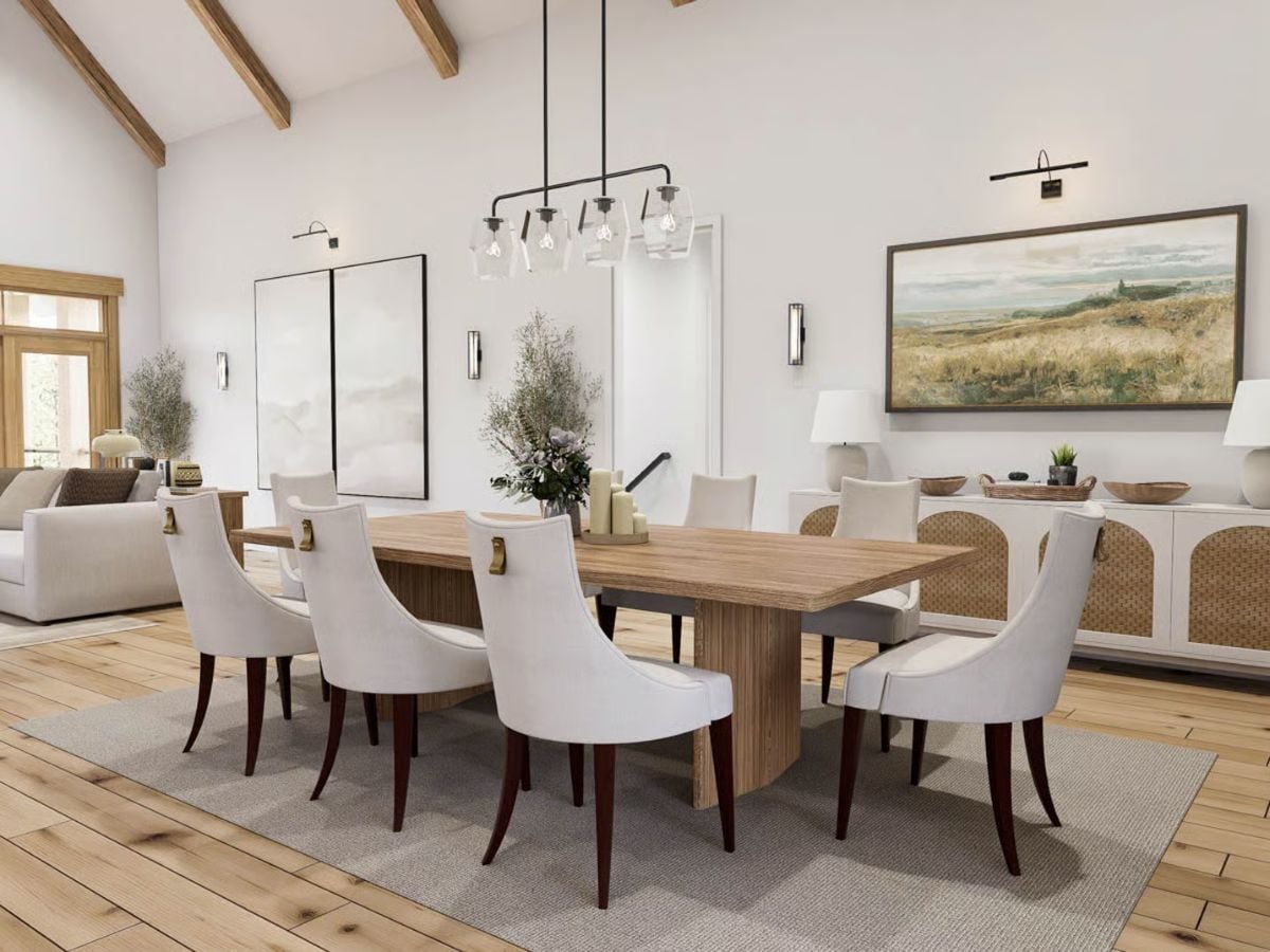 Exposed Beams and Upholstered Chairs Set the Tone in This Farmhouse Dining Room