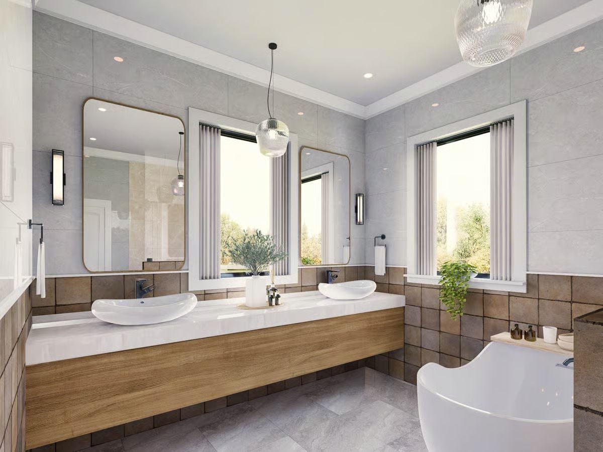 Vessel Sinks, Warm Oak Cabinetry, and Globe Pendants Shape a Bathroom Built for Two