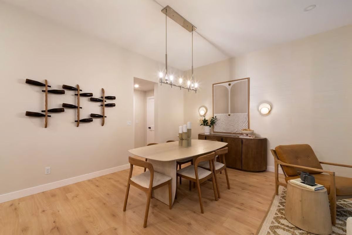 Wall-Mounted Wine Rack and Warm Wood Tones Define a Modern Dining Room