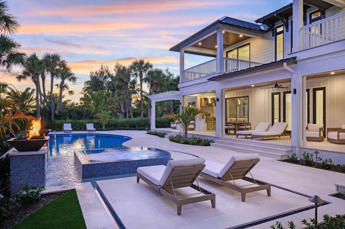 Fire Bowl, Spa, and Covered Lanai Make This Backyard Built for Evening Living