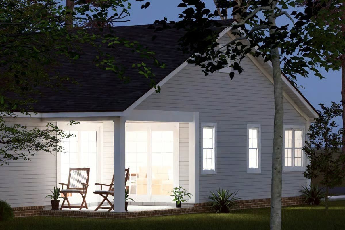 Covered Back Porch Glows Against the Dusk