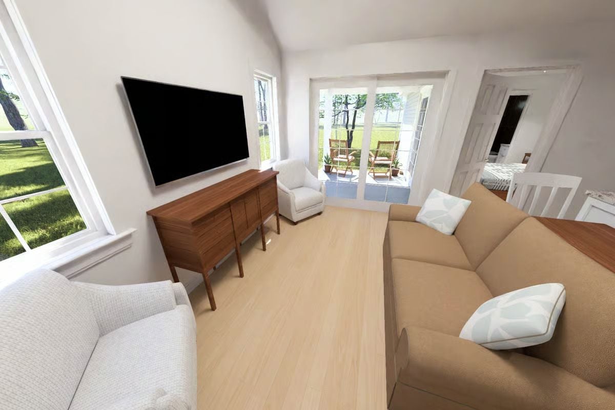 Pale Wood Floors and a Wall-Mounted TV Keep the Living Room Uncluttered