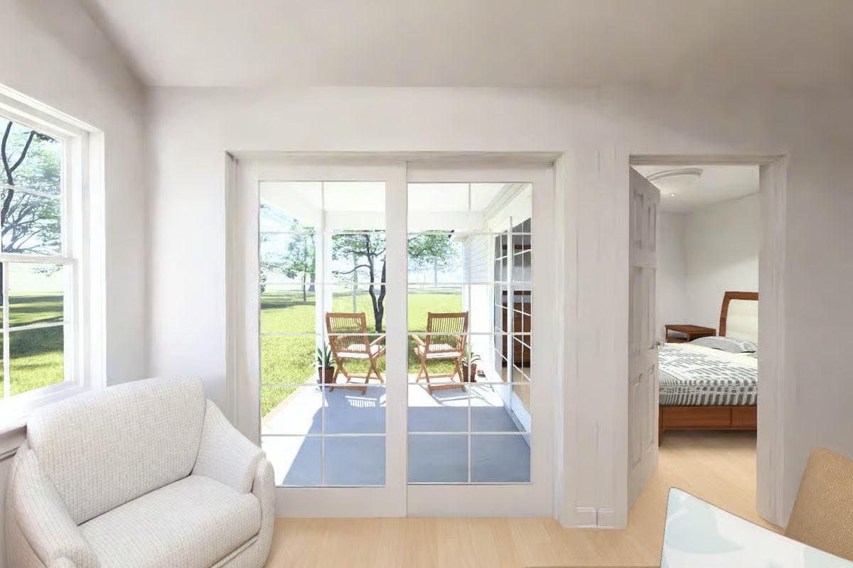 French Doors Open the Living Room Straight onto the Patio