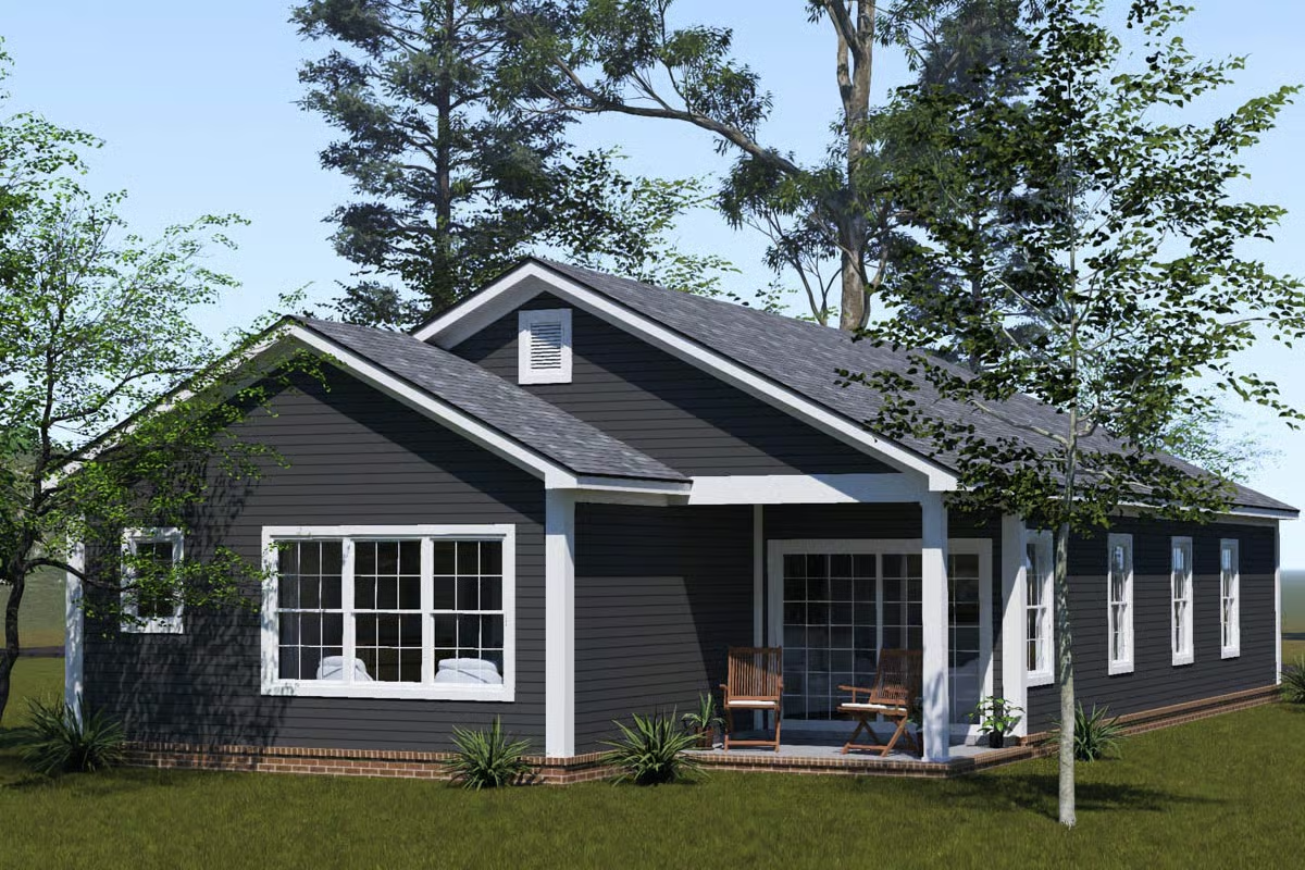 Dark Siding and White Trim Give This Narrow Cottage Real Curb Appeal