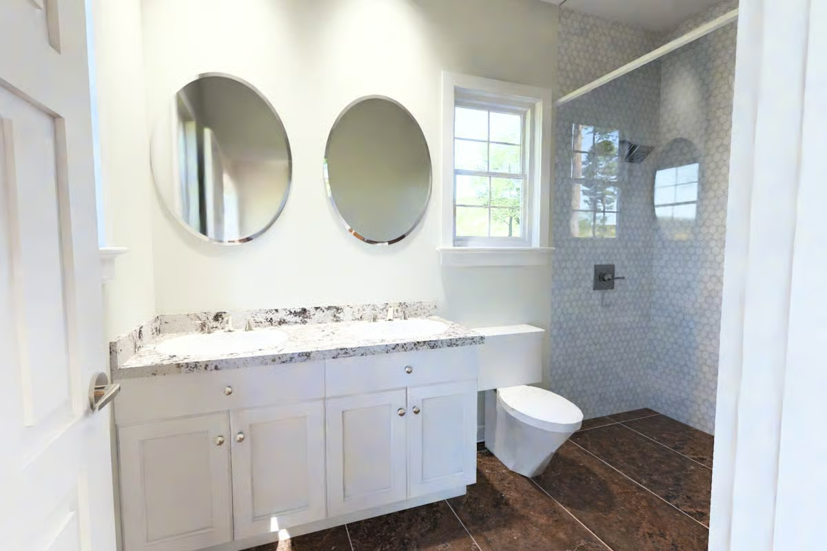 Oval Mirrors and Granite Counters Make This Double Vanity Worth a Second Look