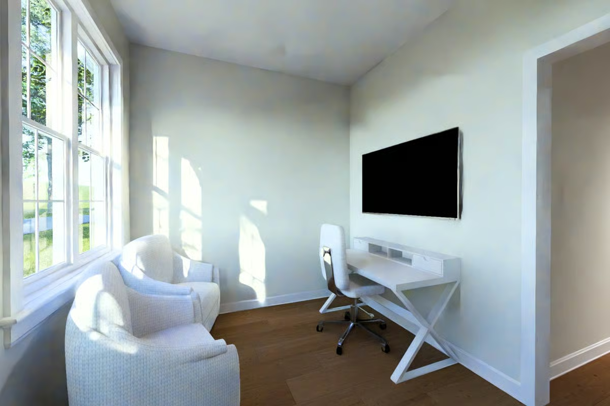 Sunlit Home Office Pairs a Wall-Mounted TV With a Clean-Lined Desk