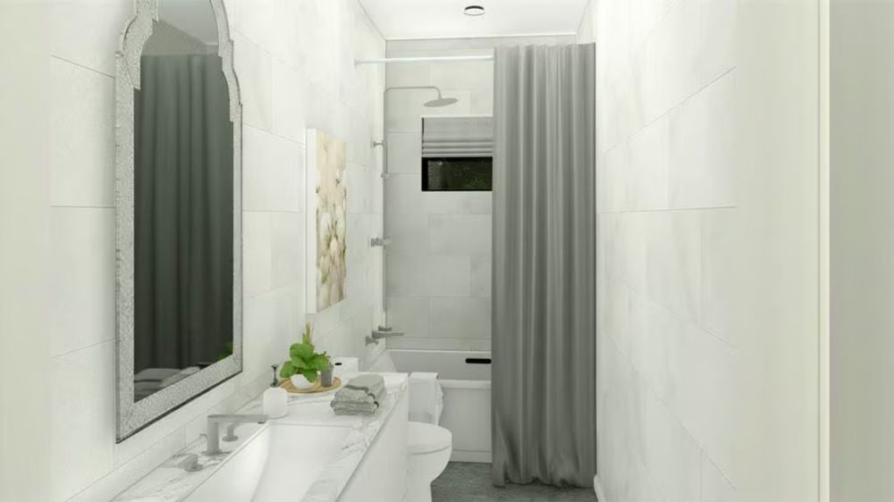 Arched Mirror and Marble Countertop Give a Narrow Bath Real Presence