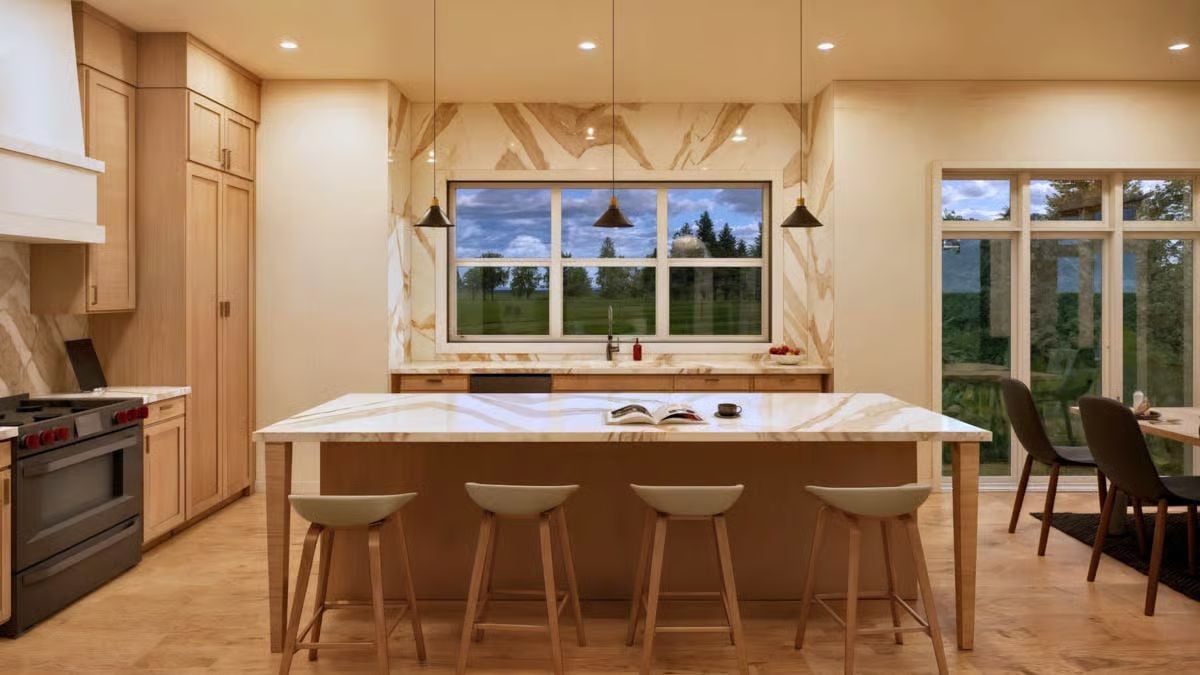 Marble Island Countertop Steals Focus in a Warm-Toned Open Kitchen