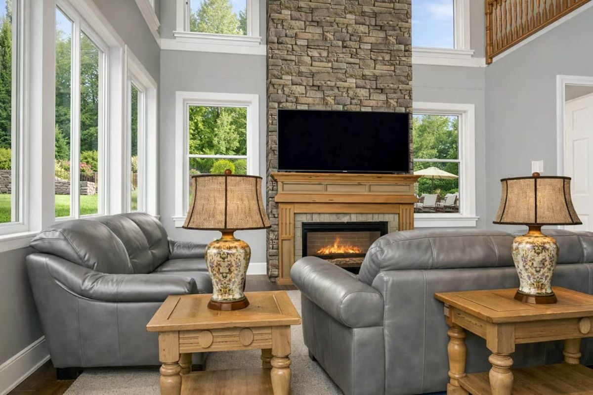 Leather Sofas, Stone Fireplace, and Natural Light from Every Angle