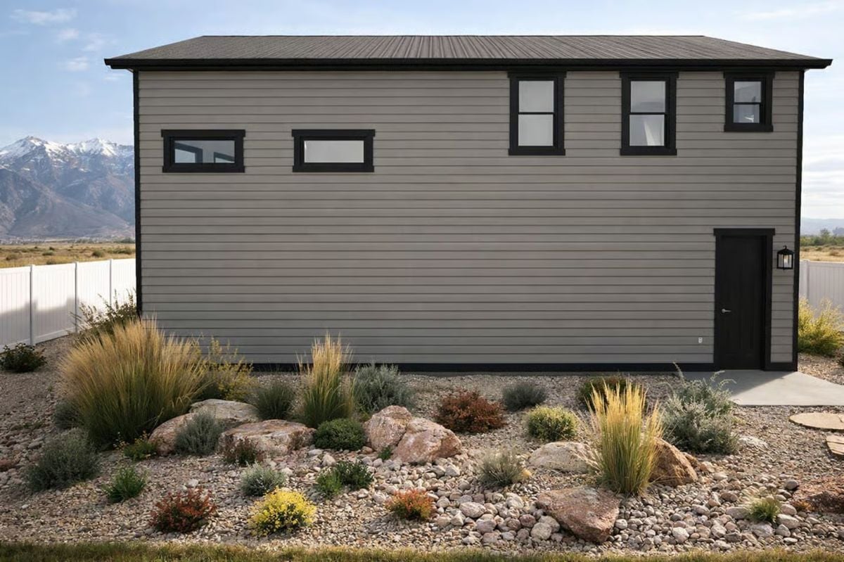 Gray Lap Siding and Black Trim Give This Barndominium a Sharp Exterior