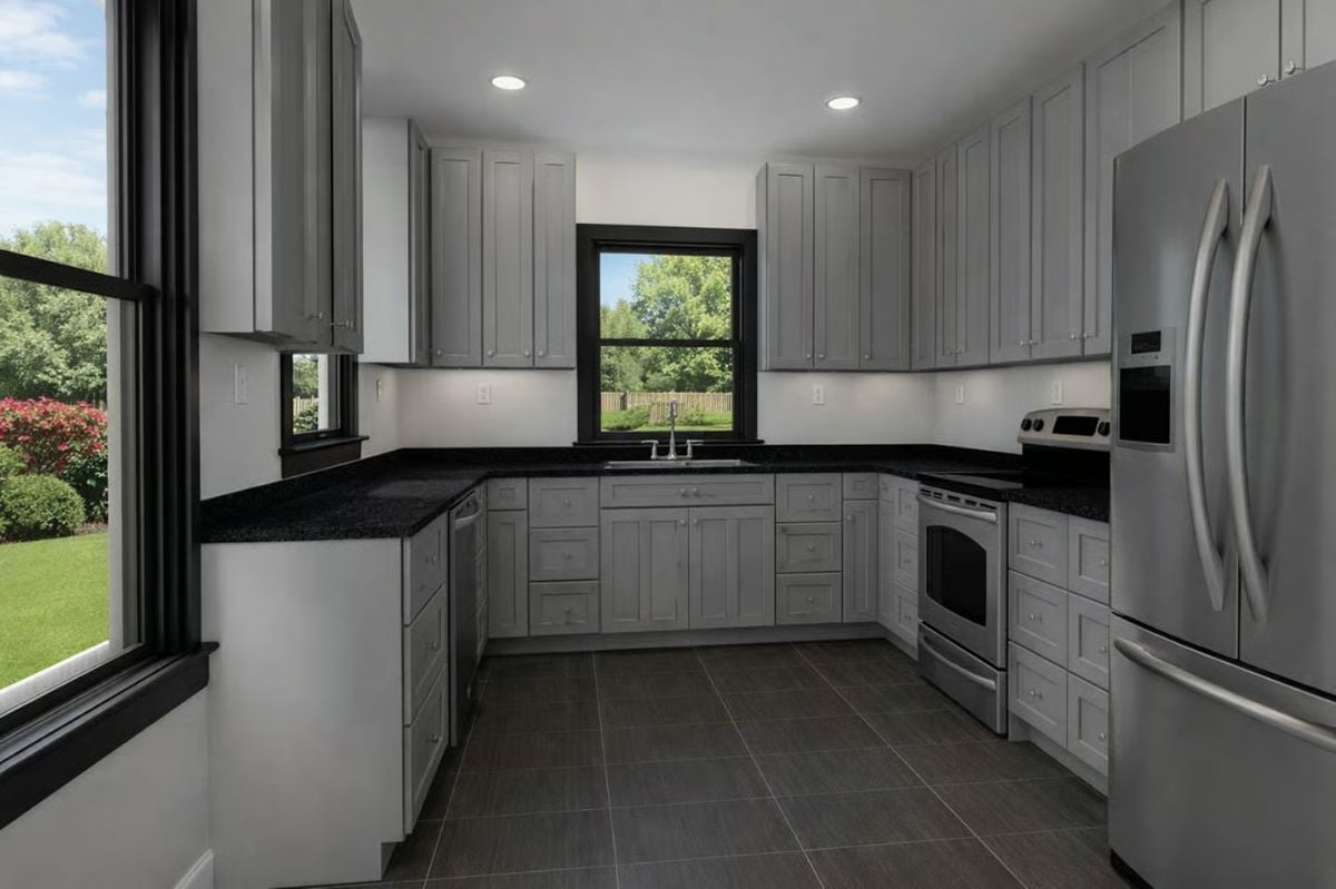 Black Granite Countertops and Shaker Cabinets Keep This Kitchen Crisp