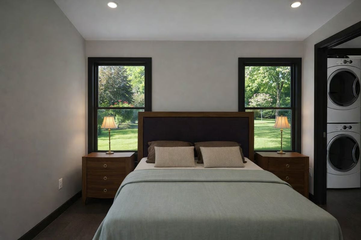 Stacked Washer and Dryer Next to the Bed Reveal a Practical Barndominium Trade-Off