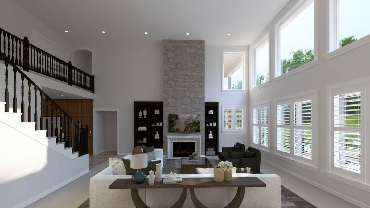 Double-Height Fireplace Wall Anchors a Light-Filled Great Room