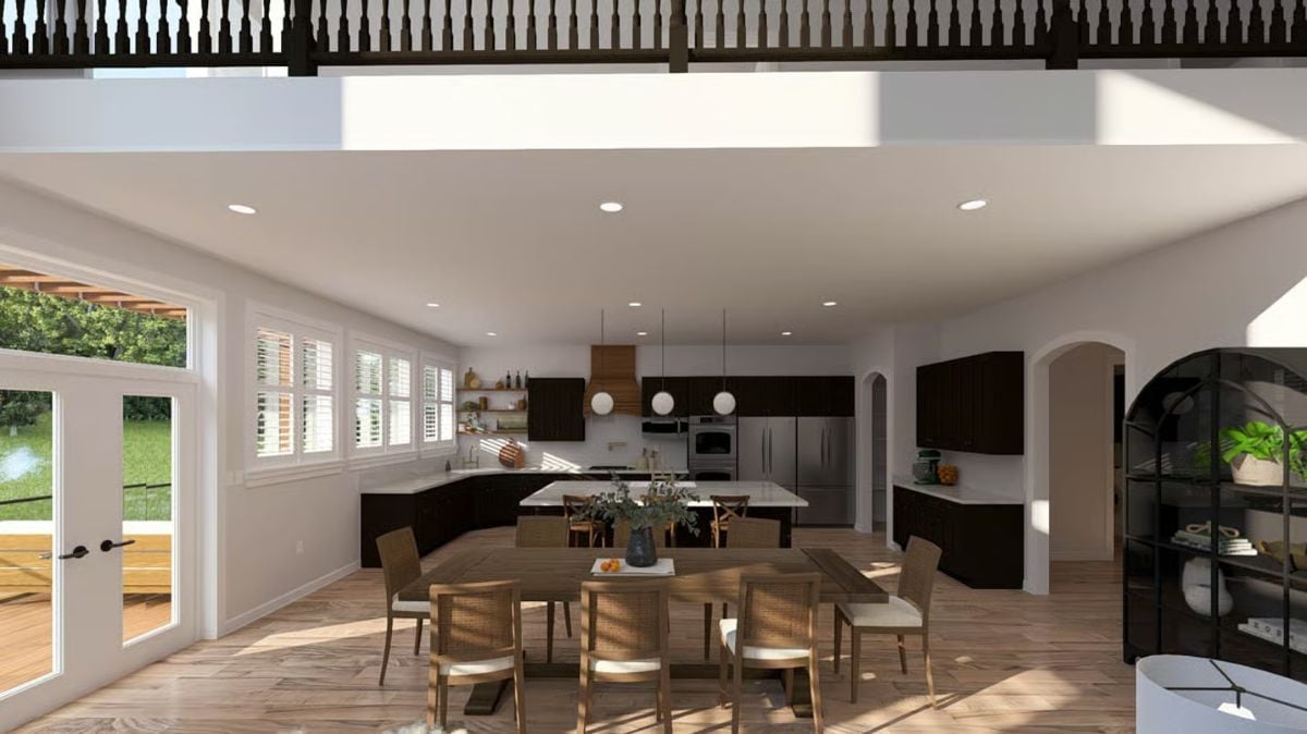 Dark Cabinetry and a Wood Island Anchor an Open Kitchen-Dining Space