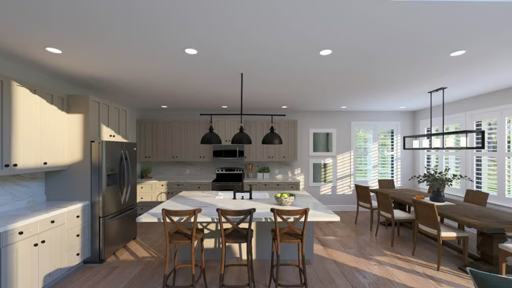 Pendant Lights and a Waterfall Island Anchor This Open Kitchen-to-Dining Flow