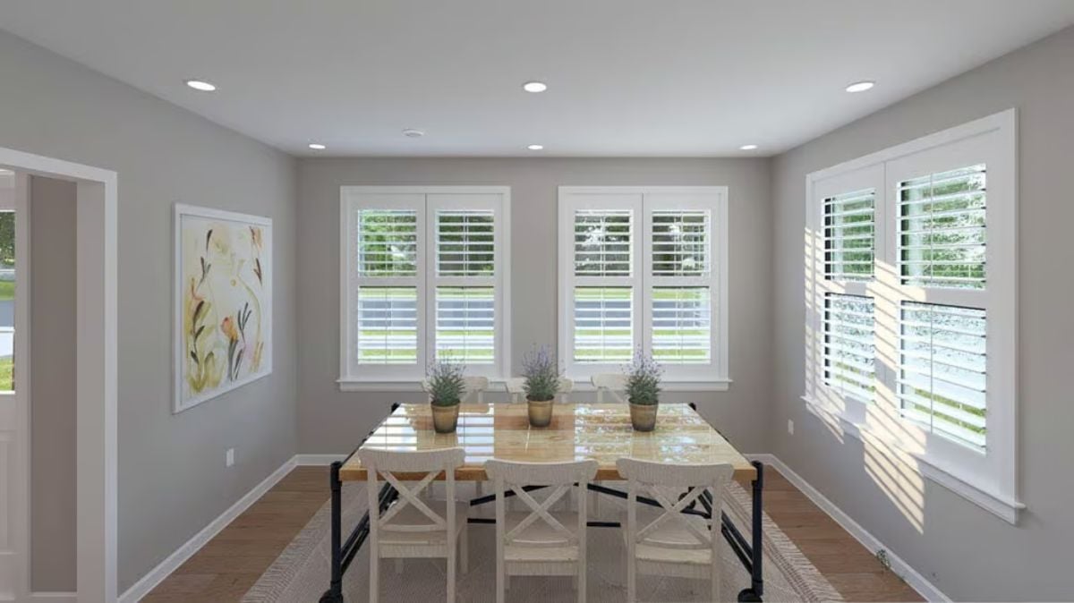 Plantation Shutters and Lavender Sprigs Keeping This Dining Room Grounded